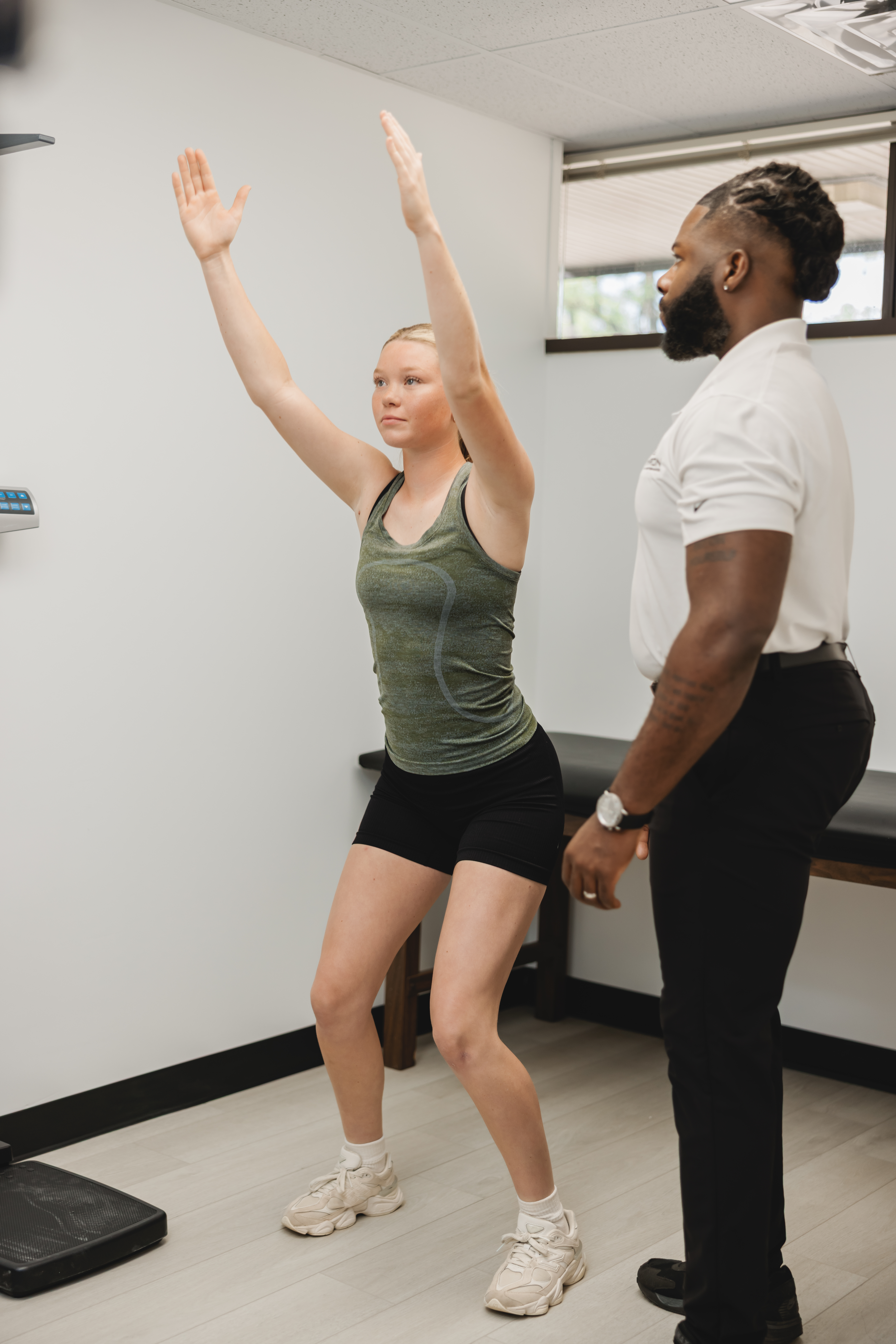 Athlete on force plates during movement assessment at Chiron Sports Performance